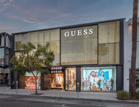 who owns guess store